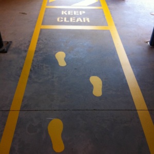 Feet Logos On Walkway