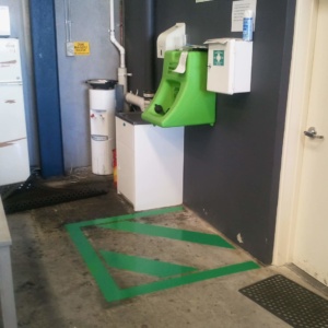 Green Safety Hatching At Eye Wash Station