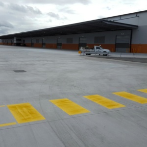 Warehouse With Long Walkway And Pedestrian Crossing Line Marking