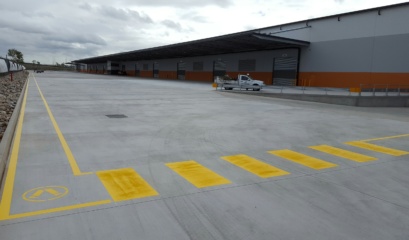 Warehouse With Long Walkway And Pedestrian Crossing Line Marking