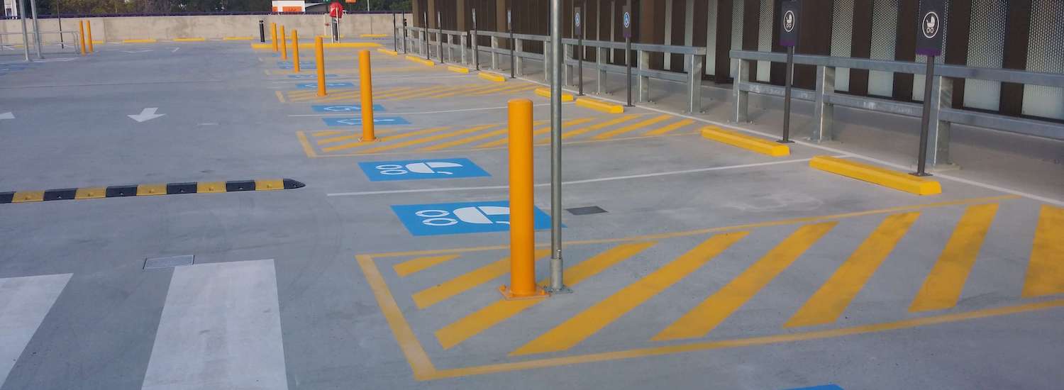 Steel Safety Bollards And Car Park With Pram Logos and speed hump and line marking